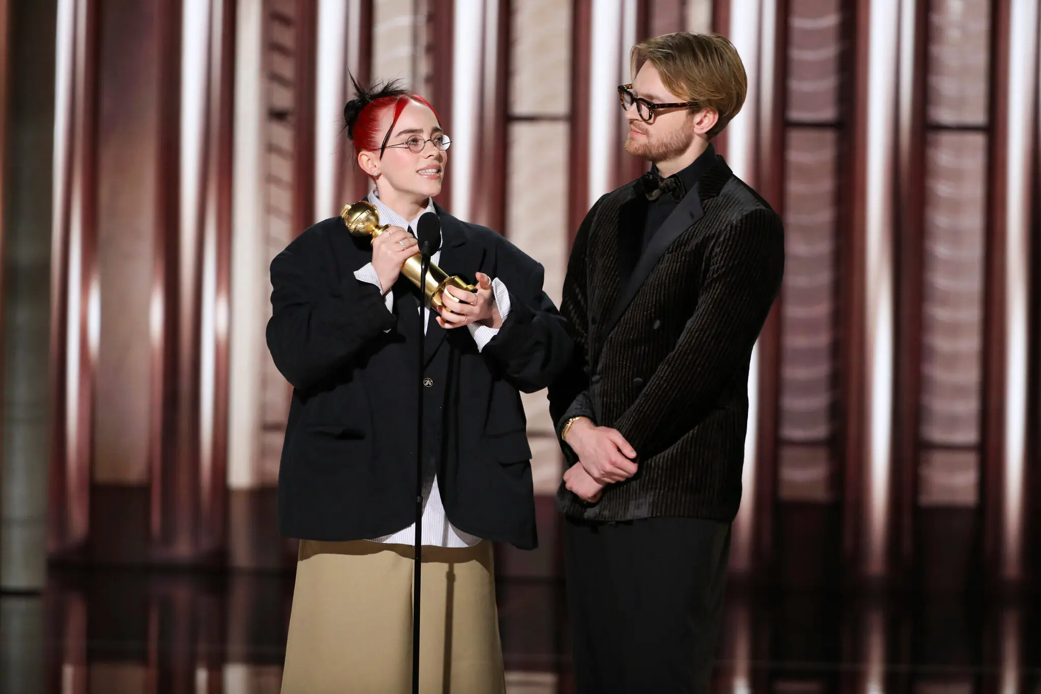 Billie Eilish O’Connell and Finneas O’Connell accepting the award for their original song in “Barbie.”Credit...Sonja Flemming/CBS