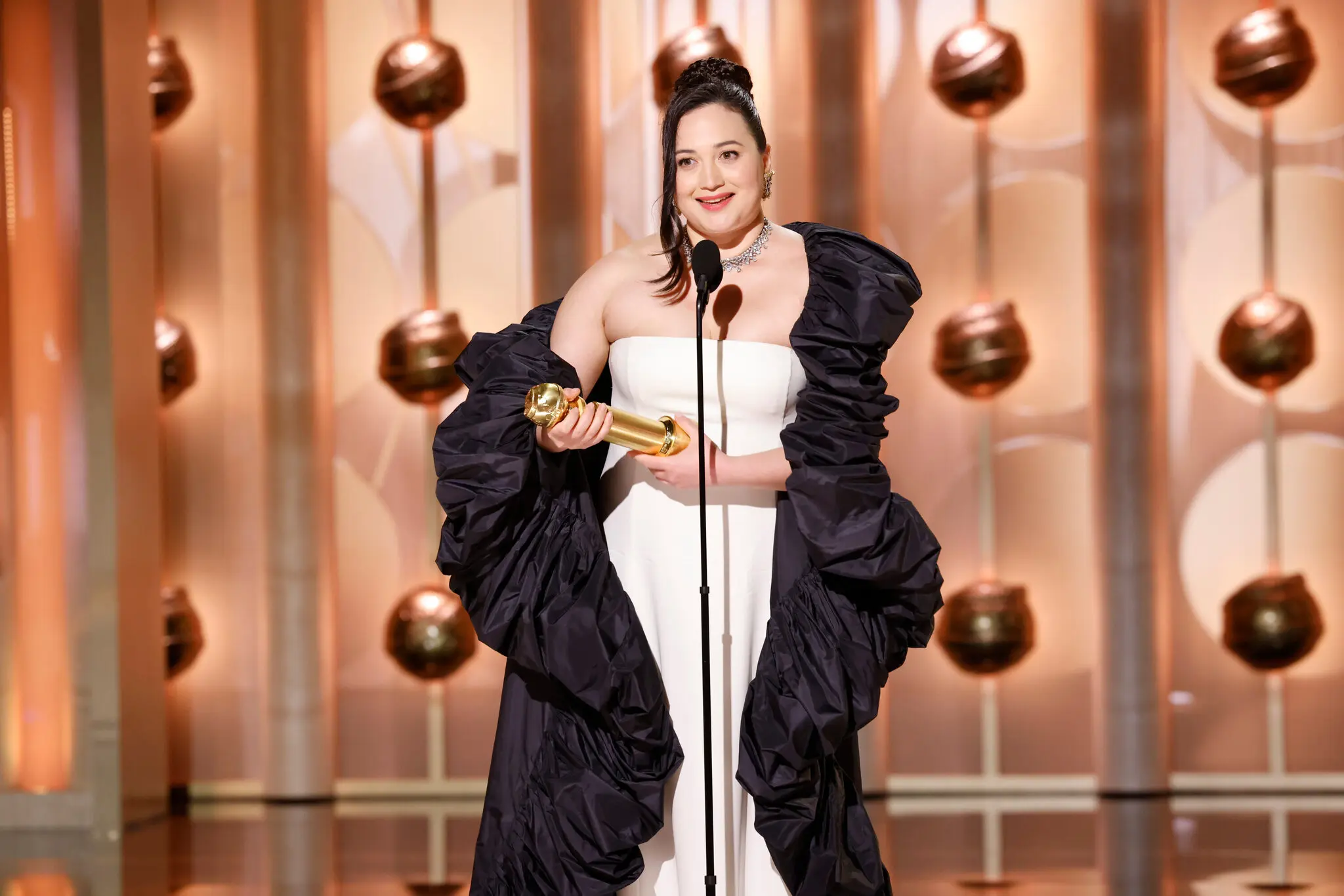 Lily Gladstone accepting the award for her lead dramatic performance in “Killers of the Flower Moon.” Credit...CBS